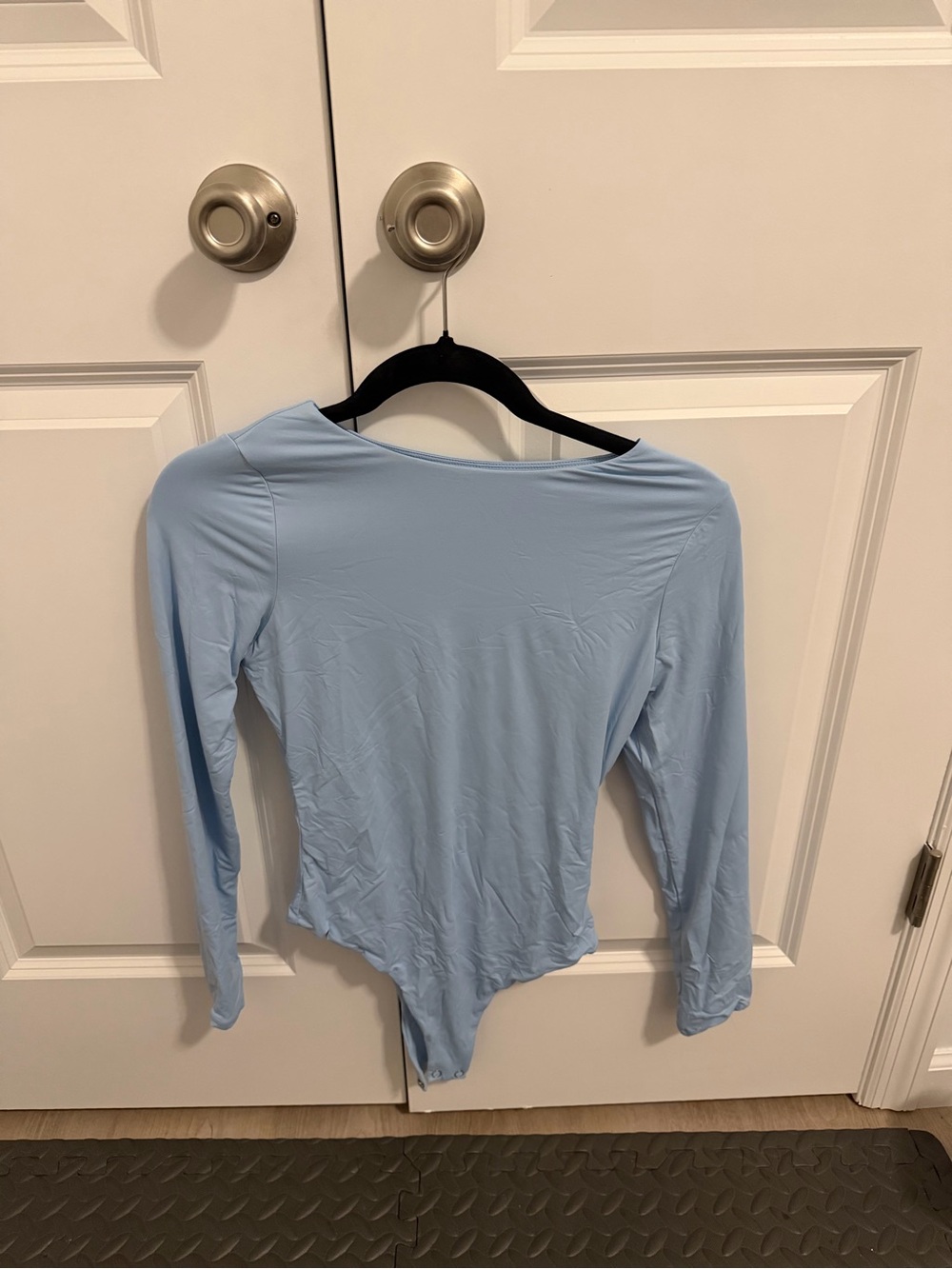 Light Blue Long-Sleeve Women’s Bodysuit
